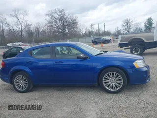 2014 Dodge Avenger SE with VIN 1C3CDZAB9EN235338, listed as a IAAI auction lot 41941403 with 144,085 mi miles. Bid and sale history available at carsss.com. Image 13.