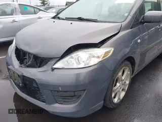 2009 Mazda 5 Touring with VIN JM1CR29L690356302, listed as a IAAI auction lot 41573737 with 127,276 mi miles. Bid and sale history available at carsss.com. Image 12.