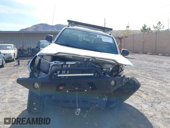 2013 Toyota Tacoma with VIN 5TFLU4EN2DX049615, listed as a IAAI auction lot 41893876 with 160,752 mi miles and . Bid and sale history available at DreamBid. Image 12.