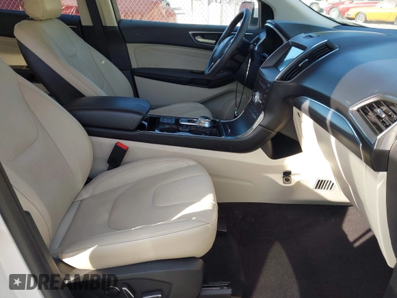 2019 Ford Edge Titanium with VIN 2FMPK3K95KBB34764, listed as a IAAI auction lot 42719541 with 128,028 mi miles and . Bid and sale history available at DreamBid. Image 5.