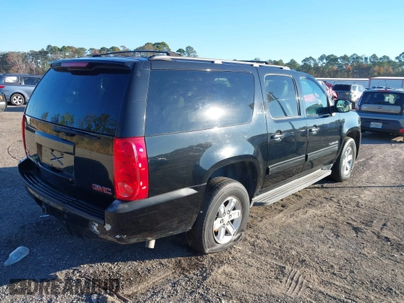 2012 GMC Yukon XL SLT with VIN 1GKS2KE71CR161613, listed as a IAAI auction lot 41021605 with 236,272 mi miles. Bid and sale history available at carsss.com. Image 4.