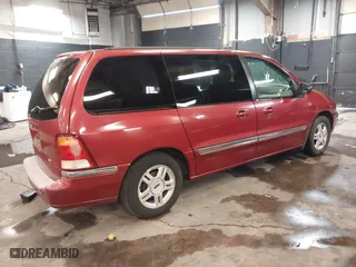 2002 Ford Windstar Wagon SE with VIN 2FMZA52442BB60882, listed as a IAAI auction lot 41621529 with 136,753 mi miles. Bid and sale history available at carsss.com. Image 4.