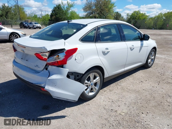2013 Ford Focus SE with VIN 1FADP3F23DL218239, listed as a IAAI auction lot 42331440 with 156,501 mi miles and . Bid and sale history available at DreamBid. Image 4.