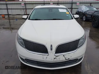 2013 Lincoln MKS with VIN 1LNHL9DK4DG605058, listed as a IAAI auction lot 41068489 with 101,801 mi miles. Bid and sale history available at carsss.com. Image 13.