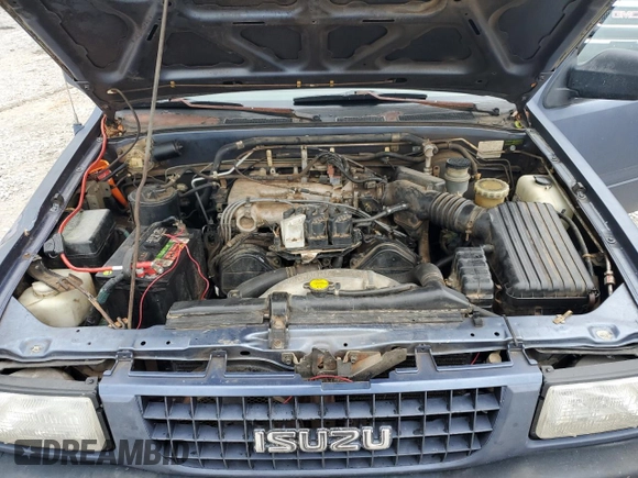1995 Isuzu Rodeo LS with VIN 4S2CG58V9S4342391, listed as a Copart auction lot 71076344 with 220,708 mi miles and Salvage Title. Bid and sale history available at carsss.com. Image 12.