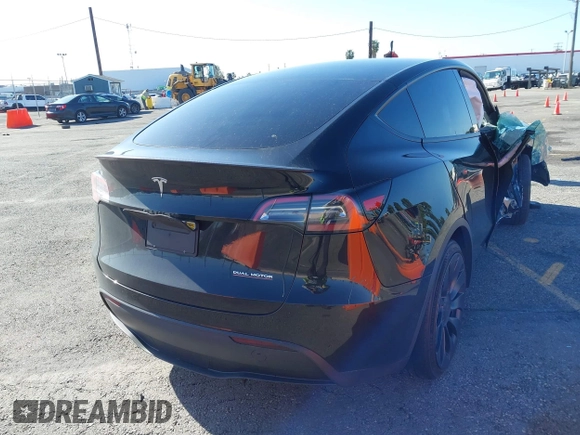 2022 Tesla Model Y Performance with VIN 7SAYGDEF5NF336693, listed as a IAAI auction lot 41805752 with 42,009 mi miles and . Bid and sale history available at DreamBid. Image 4.