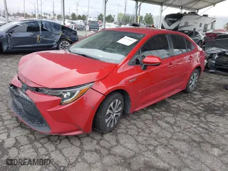 2020 Toyota Corolla Hybrid LE with VIN JTDEBRBE5LJ006033, listed as a IAAI auction lot 41778437 with 137,607 mi miles. Bid and sale history available at carsss.com. Image 17.