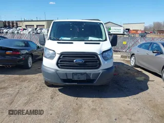 2017 Ford Transit with VIN 1FTYE1YM2HKB34459, listed as a IAAI auction lot 42059820 with 215,646 mi miles and . Bid and sale history available at DreamBid. Image 13.