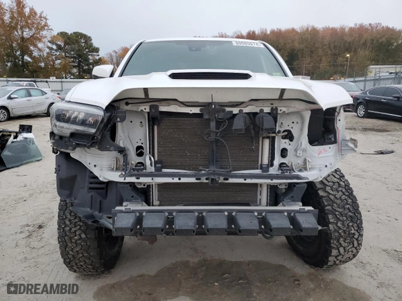 2020 Toyota Tacoma 4WD SR5 with VIN 5TFCZ5AN1LX218079, listed as a Copart auction lot 80085974 with 65,634 mi miles and Salvage Title. Bid and sale history available at carsss.com. Image 5.