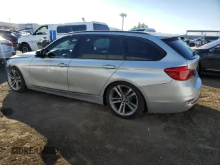 2017 BMW 3 Series 330i xDrive with VIN WBA8K3C38HK679453, listed as a Copart auction lot 89404335 with 75,451 mi miles and Salvage Title. Bid and sale history available at carsss.com. Image 2.