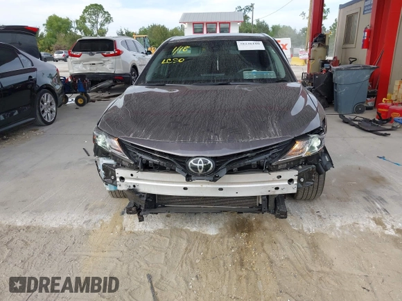 2023 Toyota Camry LE z VIN 4T1C11AK3PU719452, wystawiony jako IAAI lot #38236100 z przebiegiem 34 140 mil mil oraz . Historia ofert i sprzedaży dostępna na DreamBid. Obrazek 13.