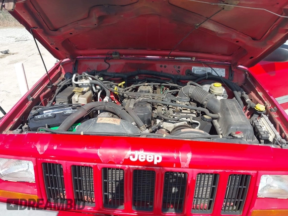 2001 Jeep Cherokee Sport z VIN 1J4FT48S01L508039, wystawiony jako IAAI lot #42743009 z przebiegiem 200 074 mil mil oraz . Historia ofert i sprzedaży dostępna na DreamBid. Obrazek 10.