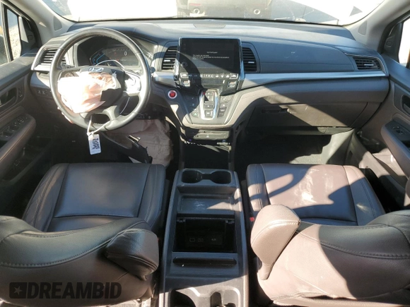 2020 Honda Odyssey Touring with VIN 5FNRL6H8XLB007622, listed as a Copart auction lot 76297494 with 83,452 mi miles and Salvage Title. Bid and sale history available at DreamBid. Image 8.