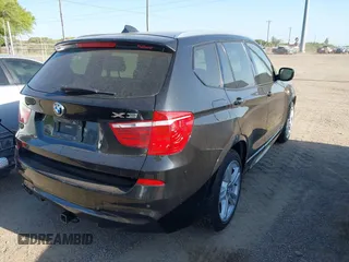 2014 BMW X3 xDrive35i with VIN 5UXWX7C56E0E81340, listed as a IAAI auction lot 41982449 with 148,415 mi miles and . Bid and sale history available at DreamBid. Image 4.
