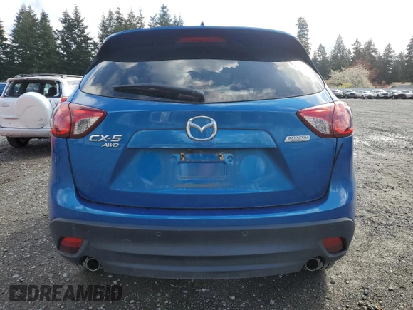 2014 Mazda CX-5 Touring with VIN JM3KE4CY3E0381134, listed as a Copart auction lot 52115015 with 52,162 mi miles and Salvage Title. Bid and sale history available at carsss.com. Image 6.