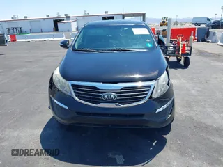 2013 Kia Sportage LX with VIN KNDPBCA25D7449584, listed as a IAAI auction lot 42489414 with 100,993 mi miles and . Bid and sale history available at DreamBid. Image 12.