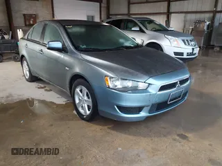 2008 Mitsubishi Lancer DE with VIN JA3AU26U08U034294, listed as a IAAI auction lot 42158892 with 50,467 mi miles. Bid and sale history available at carsss.com. Image 1.