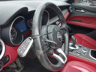 2021 Alfa Romeo Stelvio Ti with VIN ZASPAKBNXM7D15764, listed as a IAAI auction lot 41502764 with 48,714 mi miles. Bid and sale history available at carsss.com. Image 11.
