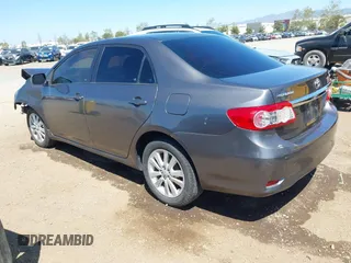 2011 Toyota Corolla L with VIN 2T1BU4EE7BC738640, listed as a IAAI auction lot 42024474 with 164,322 mi miles. Bid and sale history available at carsss.com. Image 3.