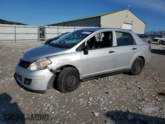 2009 Nissan Versa 1.6 with VIN 3N1CC11E09L424012, listed as a Copart auction lot 87231794 with 185,117 mi miles and Salvage Title. Bid and sale history available at carsss.com. Image 1.