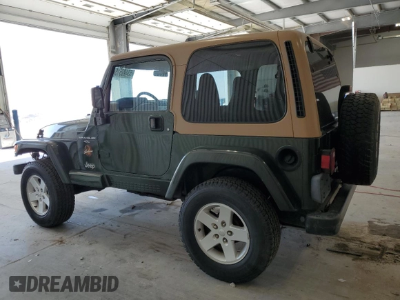 1998 Jeep Wrangler Sahara z VIN 1J4FY49S4WP728476, wystawiony jako Copart lot #53490515 z przebiegiem 272 058 mil mil oraz Czysty tytuł • Clean title. Historia ofert i sprzedaży dostępna na DreamBid. Obrazek 2.
