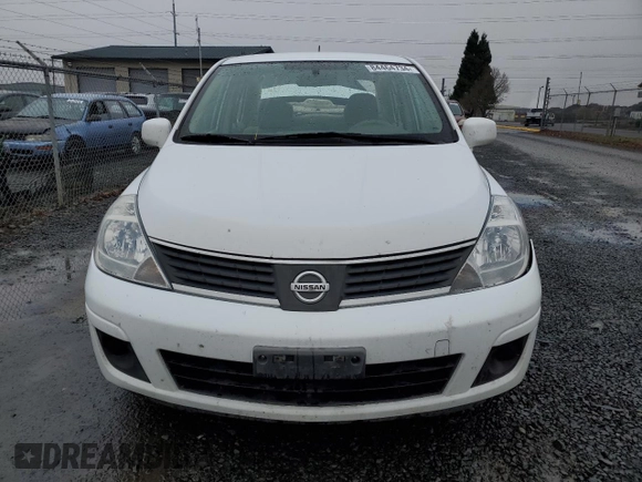 2007 Nissan Versa 1.8 SL with VIN 3N1BC11E67L402475, listed as a Copart auction lot 84464734 with 62,399 mi miles and Salvage Title. Bid and sale history available at carsss.com. Image 5.
