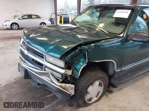 1997 Chevrolet Suburban with VIN 3GNFK16R6VG118242, listed as a IAAI auction lot 41349416 with 183,439 mi miles. Bid and sale history available at carsss.com. Image 6.