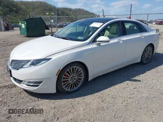 2014 Lincoln MKZ with VIN 3LN6L2J9XER808773, listed as a IAAI auction lot 42112712 with 105,832 mi miles. Bid and sale history available at carsss.com. Image 2.