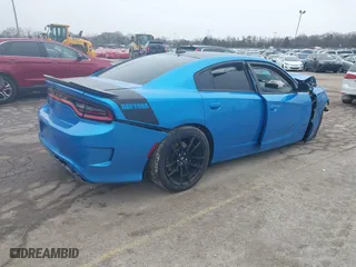 2023 Dodge Charger Scat Pack Widebody with VIN 2C3CDXGJ4PH598063, listed as a IAAI auction lot 41741090 with 4,720 mi miles. Bid and sale history available at carsss.com. Image 4.