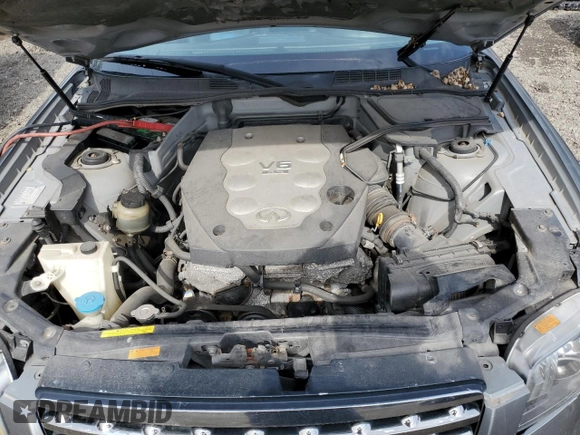 2006 Infiniti FX z VIN JNRAS08W16X203230, wystawiony jako Copart lot #51753685 z przebiegiem Nie podano mil oraz Szkoda całkowita • Salvage title. Historia ofert i sprzedaży dostępna na DreamBid. Obrazek 12.