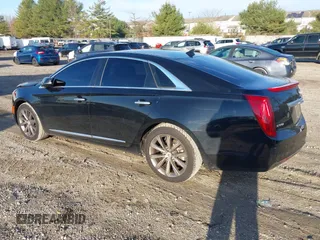 2013 Cadillac XTS z VIN 2G61N5S32D9238652, wystawiony jako IAAI lot #40966692 z przebiegiem 90 834 mil mil oraz . Historia ofert i sprzedaży dostępna na DreamBid. Obrazek 3.