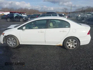 2006 Honda Civic LX with VIN 1HGFA16516L115196, listed as a IAAI auction lot 41572332 with 221,861 mi miles and . Bid and sale history available at DreamBid. Image 14.