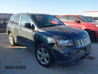 2014 Jeep Compass Latitude with VIN 1C4NJCEB0ED660117, listed as a IAAI auction lot 41035868 with 139,613 mi miles. Bid and sale history available at carsss.com. Image 1.