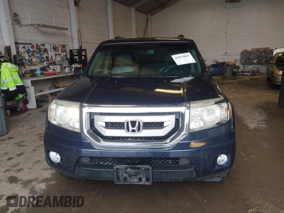 2011 Honda Pilot EX-L with VIN 5FNYF4H66BB020176, listed as a IAAI auction lot 41973659 with 238,745 mi miles and . Bid and sale history available at carsss.com. Image 12.
