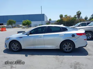 2019 Kia Optima LX z VIN 5XXGT4L34KG340899, wystawiony jako IAAI lot #42445116 z przebiegiem 118 188 mil mil oraz . Historia ofert i sprzedaży dostępna na DreamBid. Obrazek 14.
