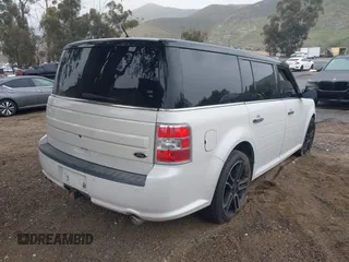 2015 Ford Flex SEL z VIN 2FMGK5C89FBA02548, wystawiony jako IAAI lot #41775436 z przebiegiem 132 856 mil mil oraz . Historia ofert i sprzedaży dostępna na DreamBid. Obrazek 4.