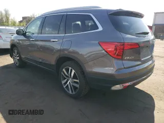 2017 Honda Pilot Touring with VIN 5FNYF6H9XHB023385, listed as a Copart auction lot 55482975 with 105,039 mi miles and Salvage Title. Bid and sale history available at carsss.com. Image 2.