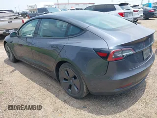 2023 Tesla Model 3 with VIN 5YJ3E1EA7PF409243, listed as a IAAI auction lot 42305360 with Not provided miles and . Bid and sale history available at DreamBid. Image 3.