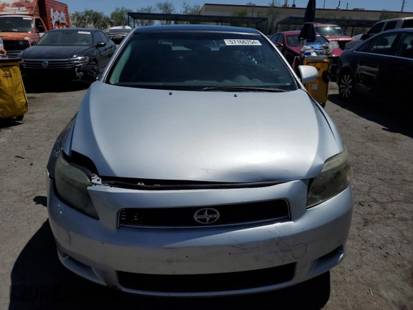 2005 Scion tC with VIN JTKDE177850022873, listed as a Copart auction lot 57166754 with 194,678 mi miles and Salvage Title. Bid and sale history available at carsss.com. Image 5.