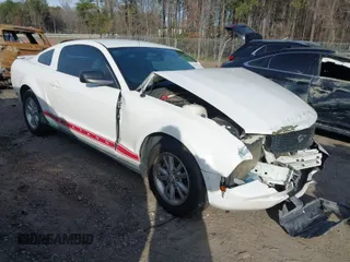 2008 Ford Mustang Deluxe with VIN 1ZVHT80N885121973, listed as a IAAI auction lot 41612311 with 151,994 mi miles. Bid and sale history available at carsss.com. Image 1.