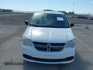 2014 Dodge Grand Caravan American Value with VIN 2C4RDGBG8ER140342, listed as a IAAI auction lot 42198306 with 135,564 mi miles and . Bid and sale history available at DreamBid. Image 6.