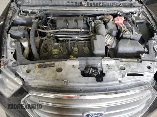 2013 Ford Taurus SEL with VIN 1FAHP2H88DG172316, listed as a Copart auction lot 54872575 with 154,926 mi miles and Salvage Title. Bid and sale history available at DreamBid. Image 11.