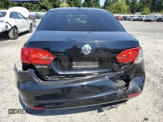 2014 Volkswagen Jetta SE z VIN 3VWD17AJ2EM397825, wystawiony jako Copart lot #64076595 z przebiegiem 61 691 mil mil oraz Szkoda całkowita • Salvage title. Historia ofert i sprzedaży dostępna na DreamBid. Obrazek 6.