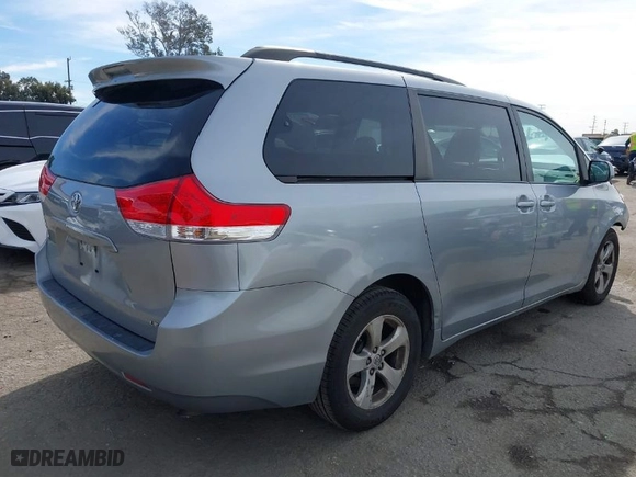 2014 Toyota Sienna LE AAS with VIN 5TDKK3DC0ES485124, listed as a IAAI auction lot 41690444 with 158,519 mi miles. Bid and sale history available at carsss.com. Image 4.