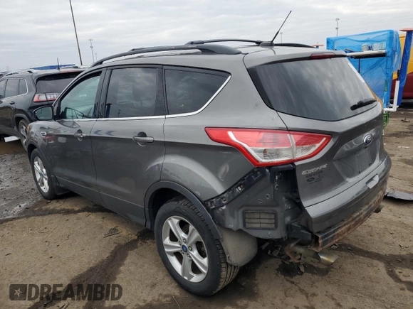 2014 Ford Escape SE with VIN 1FMCU9GX4EUA83808, listed as a Copart auction lot 86821174 with 112,853 mi miles and Clean title. Bid and sale history available at DreamBid. Image 2.