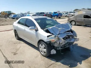 2012 Toyota Yaris with VIN JTDBT4K33C1416217, listed as a Copart auction lot 46714115 with 212,894 mi miles and Salvage Title. Bid and sale history available at DreamBid. Image 13.