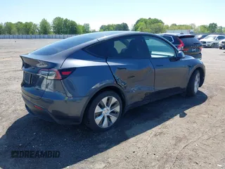 2022 Tesla Model Y Long Range with VIN 7SAYGDEE7NF426404, listed as a IAAI auction lot 42040490 with 39,635 mi miles and . Bid and sale history available at carsss.com. Image 4.