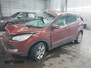 2016 Ford Escape Titanium with VIN 1FMCU9JXXGUA53238, listed as a IAAI auction lot 38472772 with Not Provided miles and . Bid and sale history available at DreamBid. Image 2.