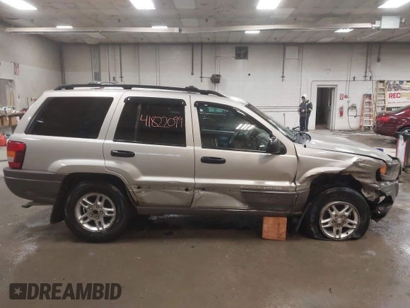 2004 Jeep Grand Cherokee Laredo with VIN 1J4GW48S44C321869, listed as a IAAI auction lot 41822099 with 181,663 mi miles. Bid and sale history available at carsss.com. Image 13.