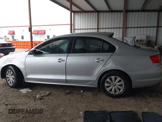 2014 Volkswagen Jetta Sedan S with VIN 3VW2K7AJ3EM310020, listed as a IAAI auction lot 41338164 with 76,456 mi miles. Bid and sale history available at carsss.com. Image 14.